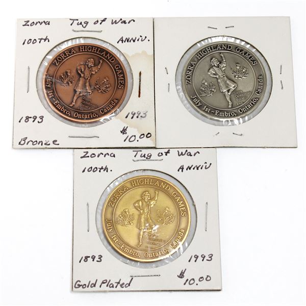 Lot of 3x Zorro Highland Games Tug of War Team Medallions. Includes all different medals. Gold-Plate