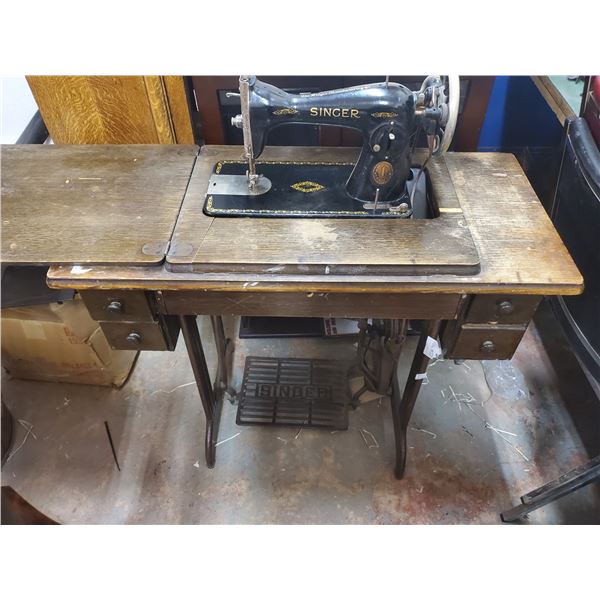 Cabinet Singer sewing machine model JB142452