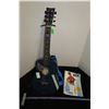 Image 1 : Child's guitar stand - book