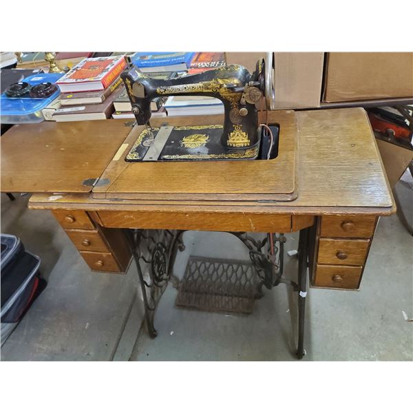 Cabinet Singer sewing machine model 8776010
