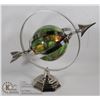 Image 1 : TURNING ARROW SPHERE GLOBE