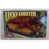 Image 1 : NEW IN BOX MOTION ACTIVATED LUCKY THE LOBSTER