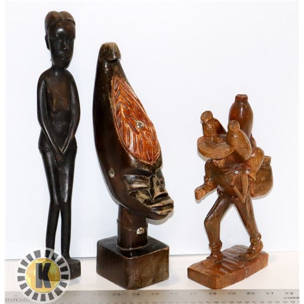 FLAT WITH 3 CARVED WOOD FIGURES