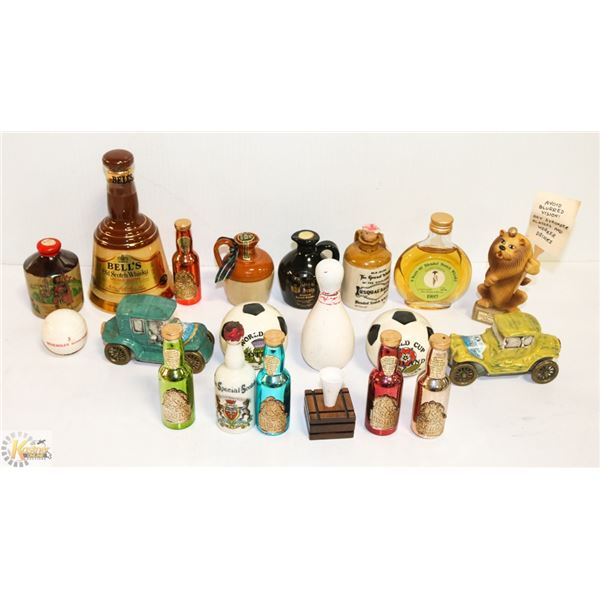 FLAT OF WHISKY DECANTERS AND ALCOHOL BOTTLES