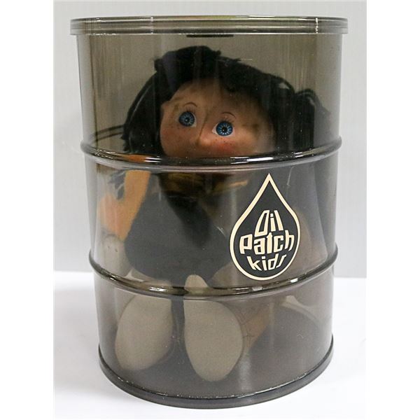 OIL PATCH KIDS 1985 DOLL IN AN OIL BARREL WITH