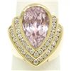 Image 1 : 14k Yellow Gold Bezel Pear Morganite & Diamond Channels 8.05 ctw Large Ring