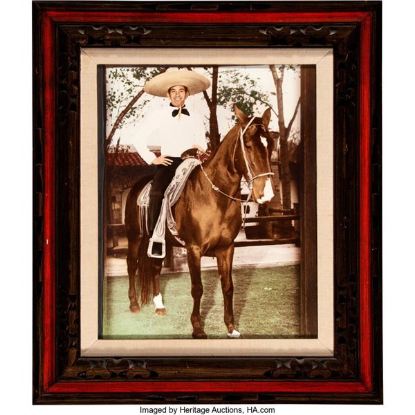 Trini Lopez Large Color Portrait.  A print of Trini with a sombrero on a horse,