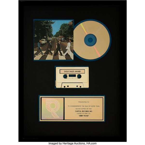 The Beatles Abbey Road RIAA R Hologram Cassette and CD Gold Sales Award. Believe
