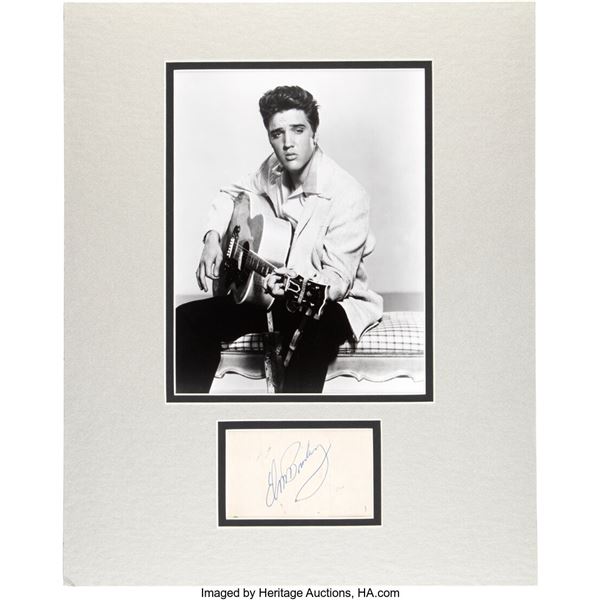 Elvis Presley Signed Card In Matte.  A white card signed by the King with a blue