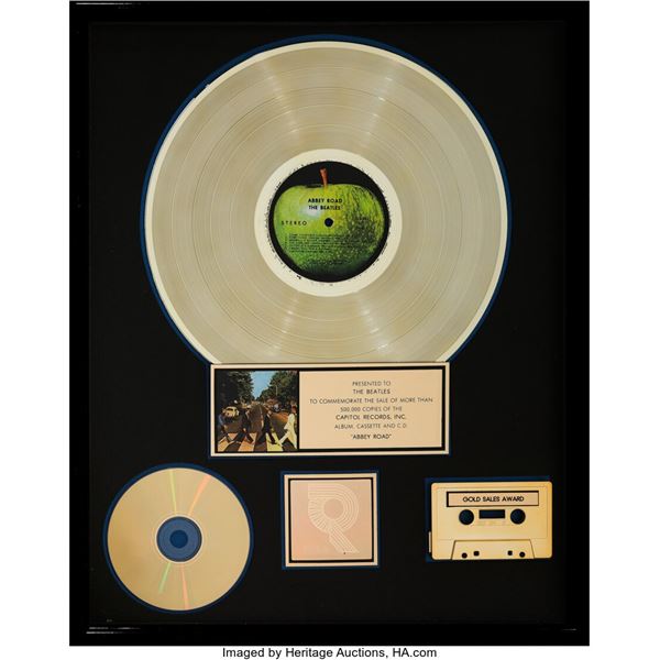 The Beatles Presented Abbey Road RIAA R Hologram Gold Sales Award. A gold award