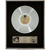Image 1 : Madonna Like a Virgin RIAA Platinum Sales Award Presented to Rob Prinz (Sire). A