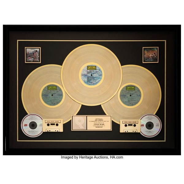 Woodstock RIAA Hologram R Gold Sales Award Presented To Promoter Artie Kornfeld.