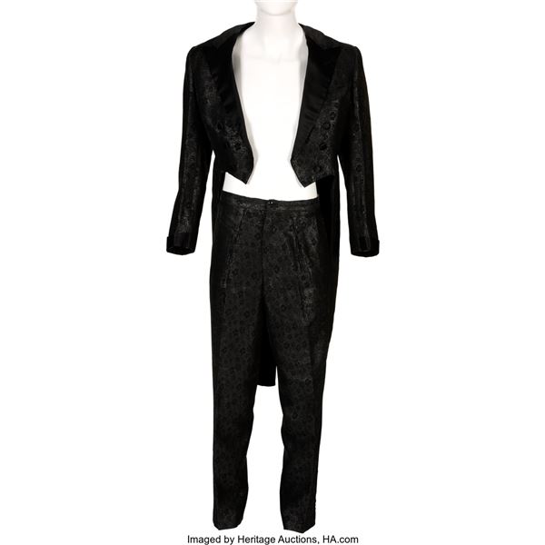 Liberace Worn Suit.  A black jacket and pants worn by the stage and screen legen
