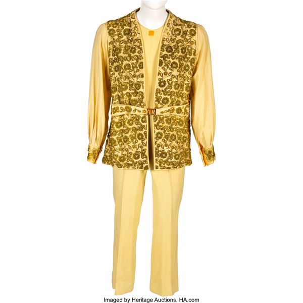 Liberace Worn Suit. A yellow-colored, gold-beaded sparkling coat with a yellow j