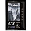 Image 1 : Stevie Ray Vaughan Signed Photo With Guitar Strap. Matted and framed to an amazi