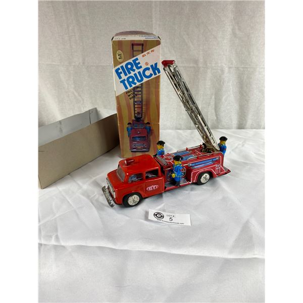 Vintage Fire Truck friction with siren in original box very good condition