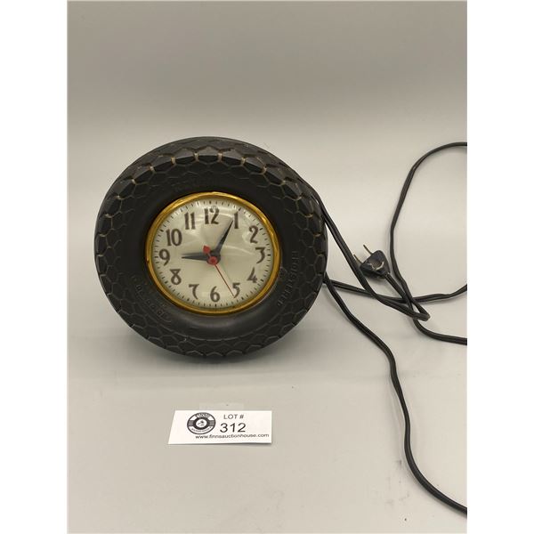 A Nice Table Top Kelly Tires Vintage Clock In Working Condition