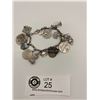 Image 1 : 800 Silver Bracelet With Mostly Sterling Charms