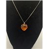 Image 1 : Genuine Amber Heart Shaped Pendant on a 15" Long Sterling Silver Chain