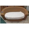 Image 1 : Woven Synthetic Rattan Lounger w/ White Dust Cover Over Cushion 74"x34". Back (top) has slight damag