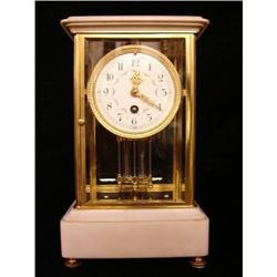 A French 4-glass white marble mantel clock  #1742264