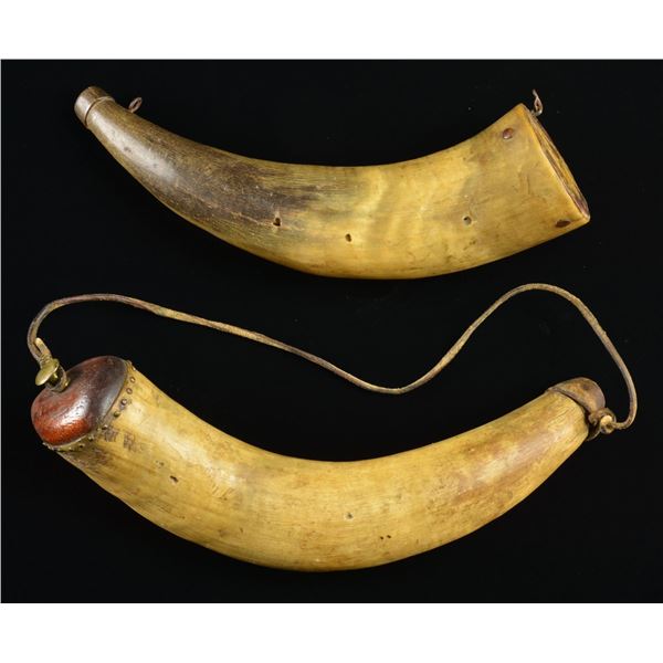 TWO 19TH CENTURY POWDER HORNS.