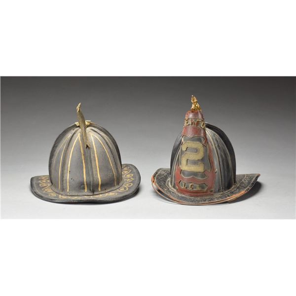 2 EARLY AMERICAN FIRE HELMETS.