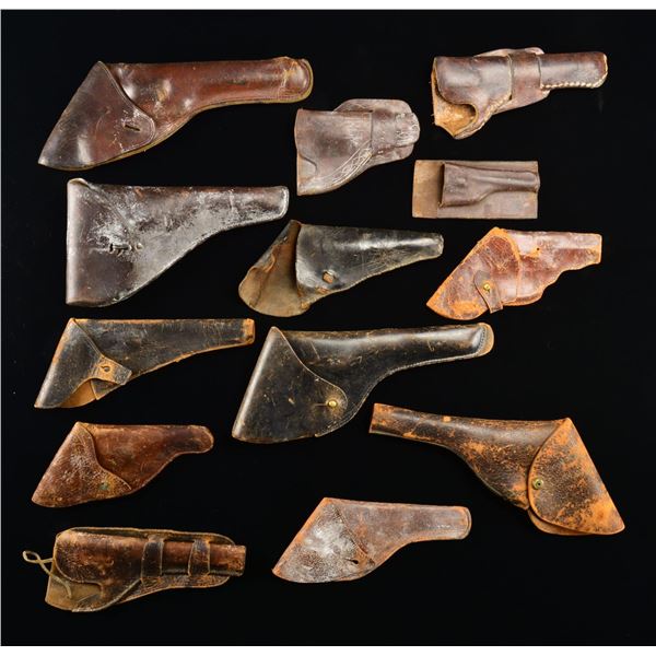 13 VINTAGE & ANTIQUE HOLSTERS.