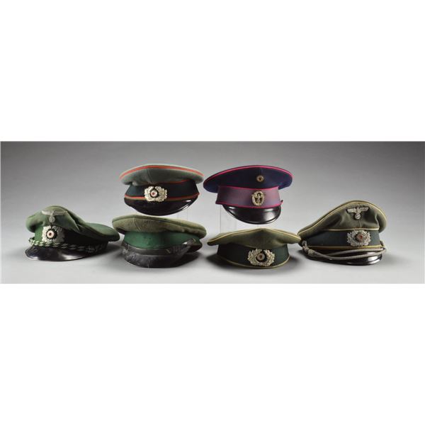 6 WWII GERMAN PEAKED CAPS.