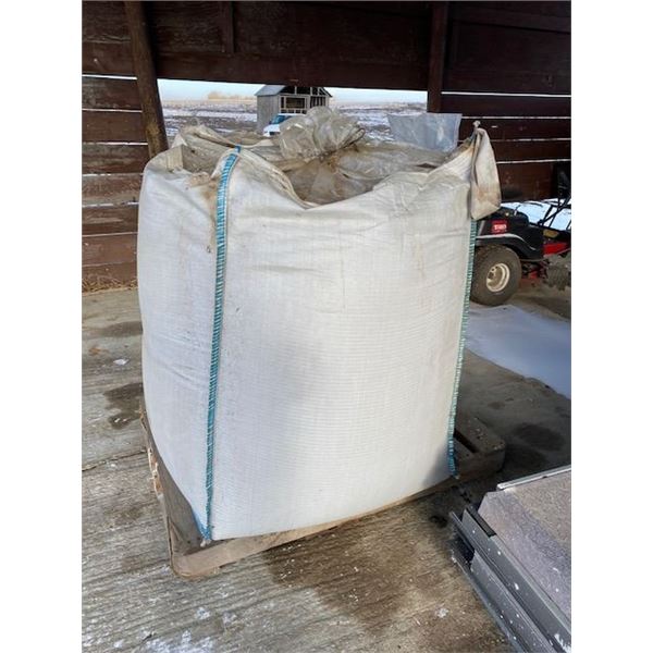 grain bag with 30 bushels  red spring seed wheat (Stanley Wheat) treated grain ready to be seeded