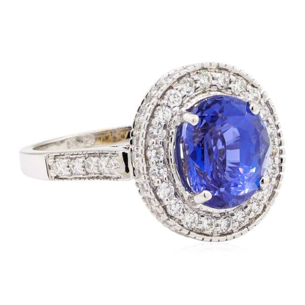 5.17 ctw Oval Mixed Blue Sapphire And Round Brilliant Cut Diamond Ring - 18KT Wh