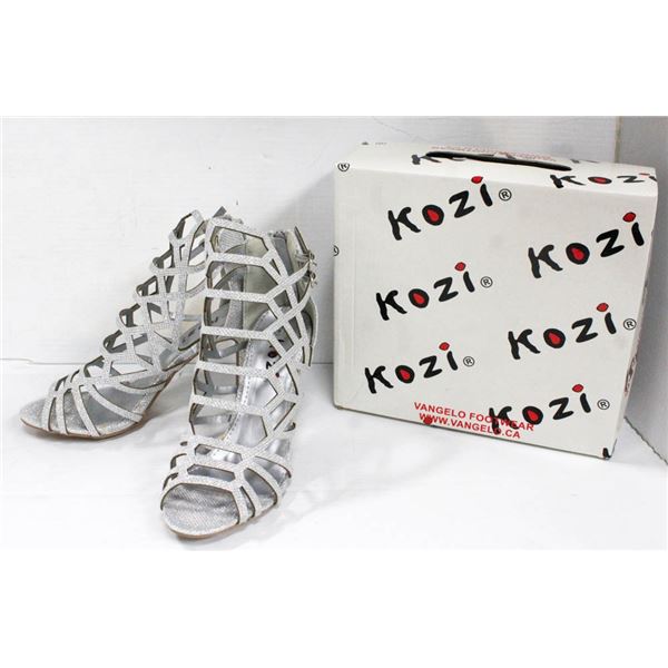 SILVER- STUDDED VANGELO/ KOZIE STRAPPY HIGH HEELS;