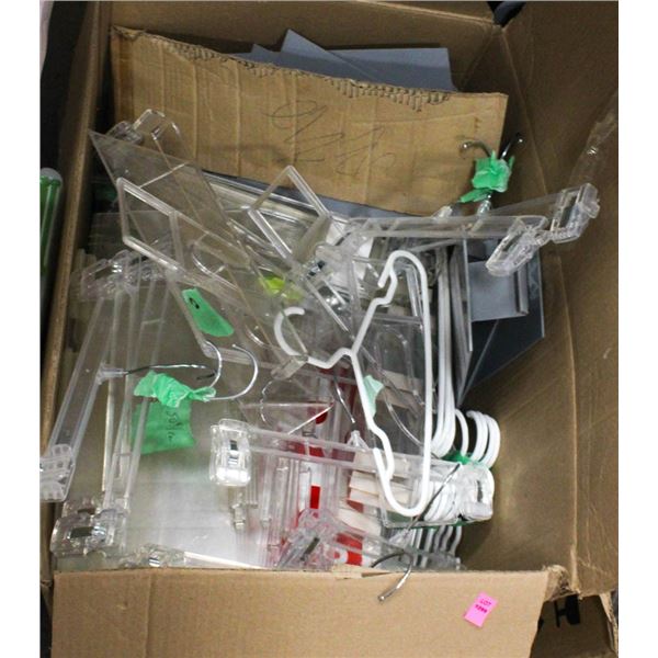 LARGE BOX OF ASSORTED HANGERS/ SIGNAGE &