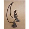 Image 1 : Modern Sculpture Girl Playing Flute on the Moon#1764913