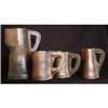 Image 1 : Set of Four Leather Jugs #1788694