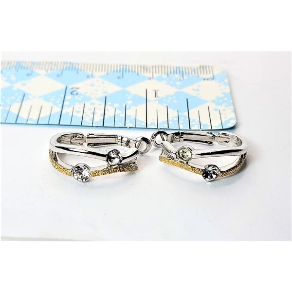 25)   SILVER AND MATTE GOLD TONE WITH CZ