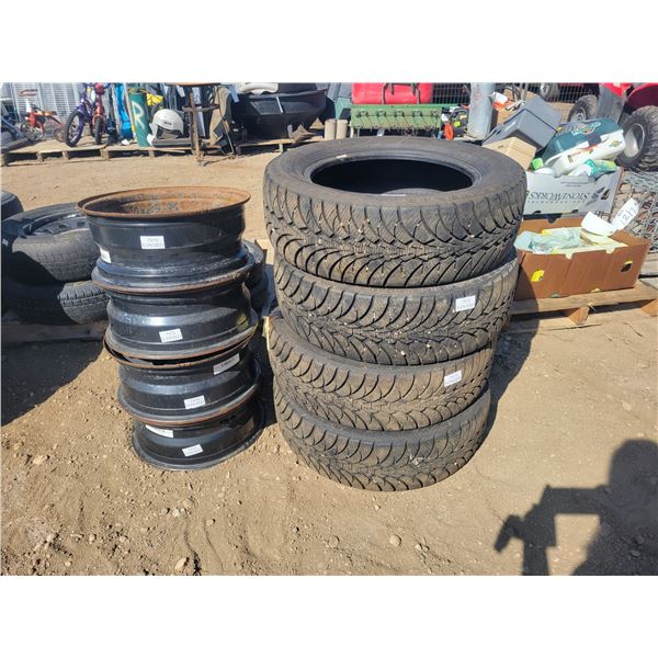 LIKE NEW set of 4 Goodyear Ultragrip ice tires 235-60-18 with steel rims