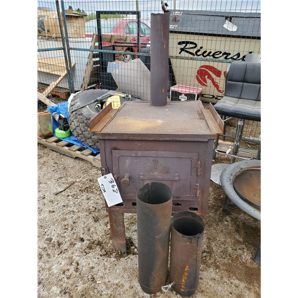 Large Wood Stove with Bricks and Stove Pipes