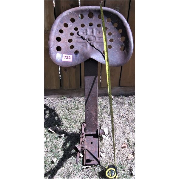 Tin tractor seat with attachment bracket