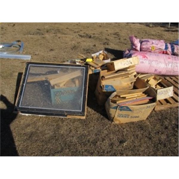 PILE OF VARIOUS LUMBER CUT OFFS; DOUBLE PANE WINDOW;