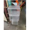 Image 1 : Three acrylic cases with sliding doors