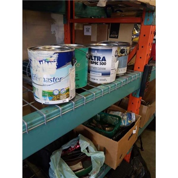 4 cans of various paint and primer