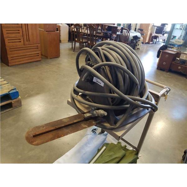 Hose reel with 100' commercial grade hose and concrete float