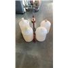 Image 1 : 4 wine carboys and wine corker