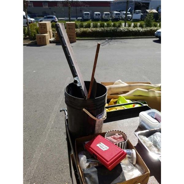 Bucket of tools with oil pump primer set and box of hardware