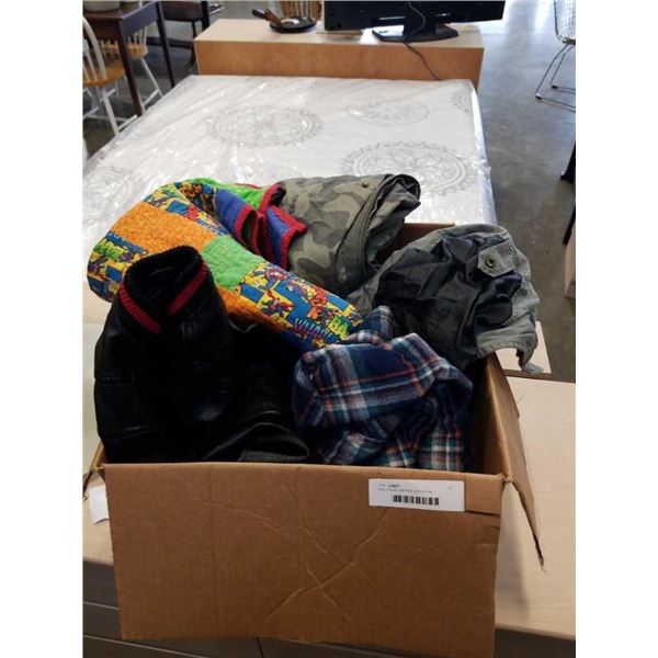 Box of books, blankets, and clothes