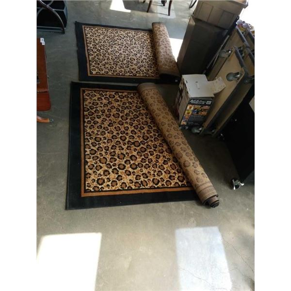 2 leopard print area carpets