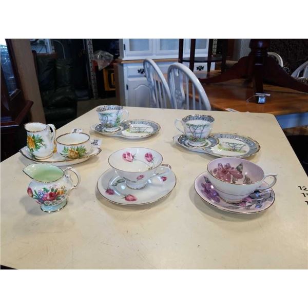 PARAGON, CLARENCE, ROYAL ALBERT CUPS AND SAUCERS AND CREAM AND SUGAR ON TRAY