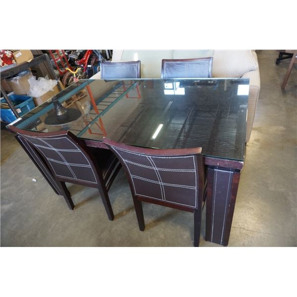 Brown dining table with leather wrap legs and 4 stitched chairs