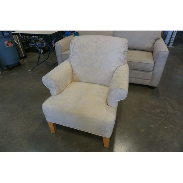 Upholstered accent armchair